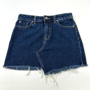 BDG denim mini skirt dark wash Urban Outfitters asymmetrical jean raw hem